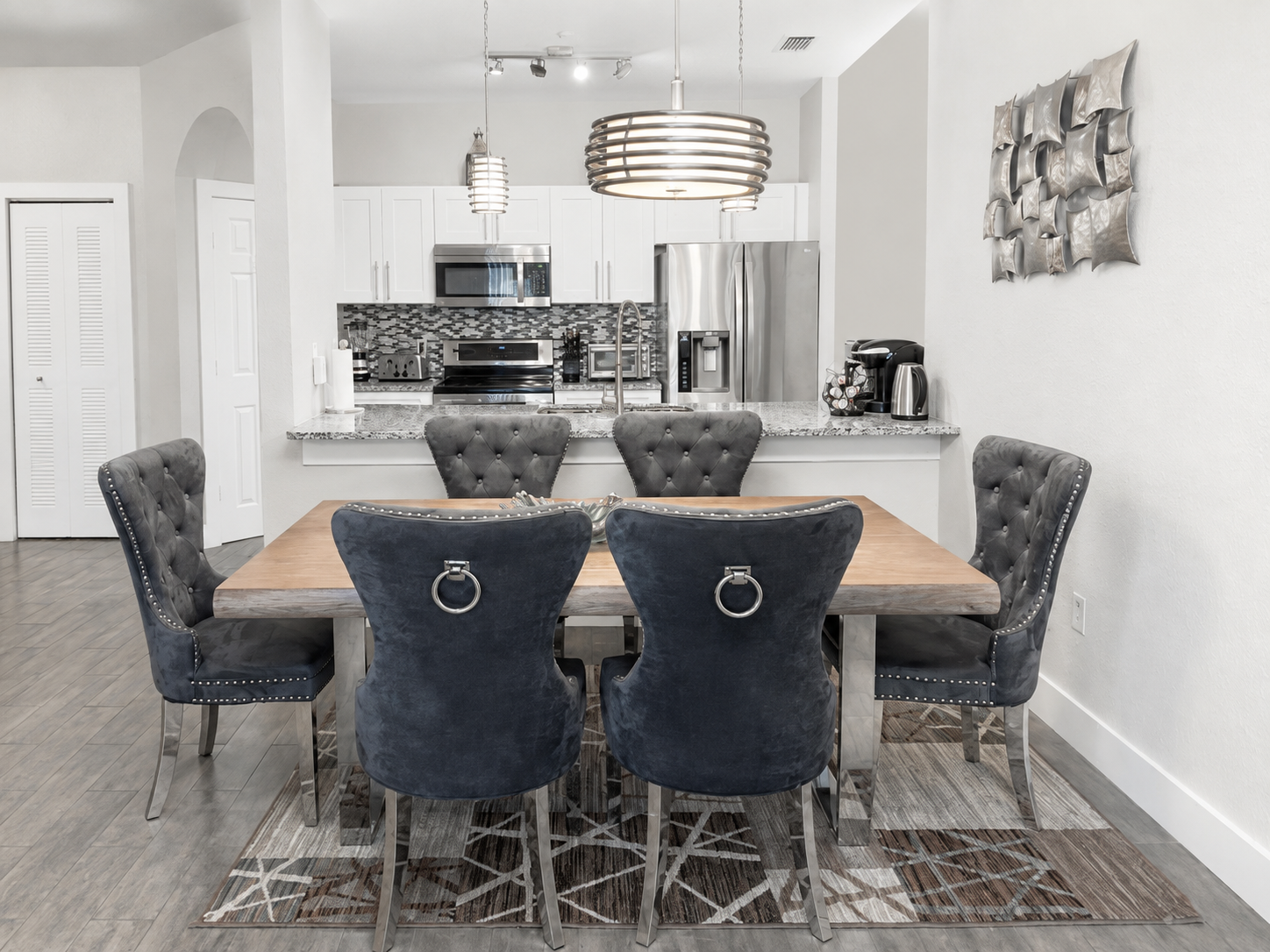 Newly refreshed dining room with six upholstered chairs