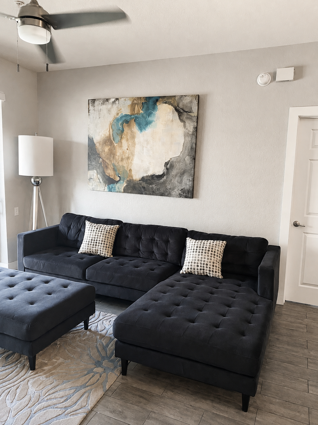 Bright living room with deep sectional seating