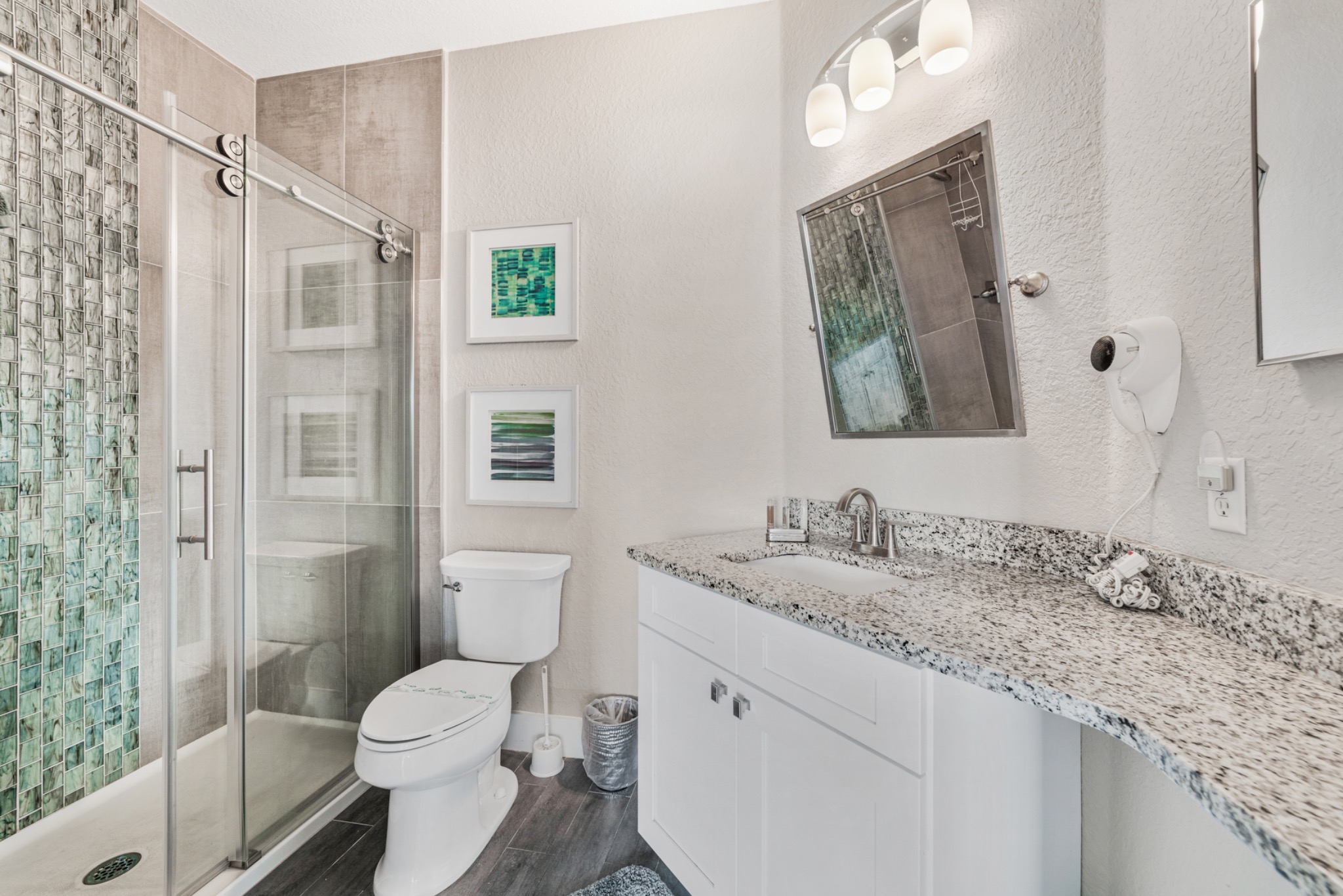 Renovated bathroom with quartz countertop
