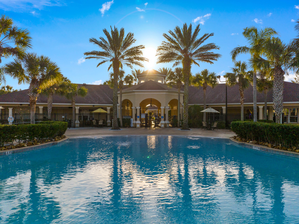 Resort pool and Windsor Hills clubhouse at sunset